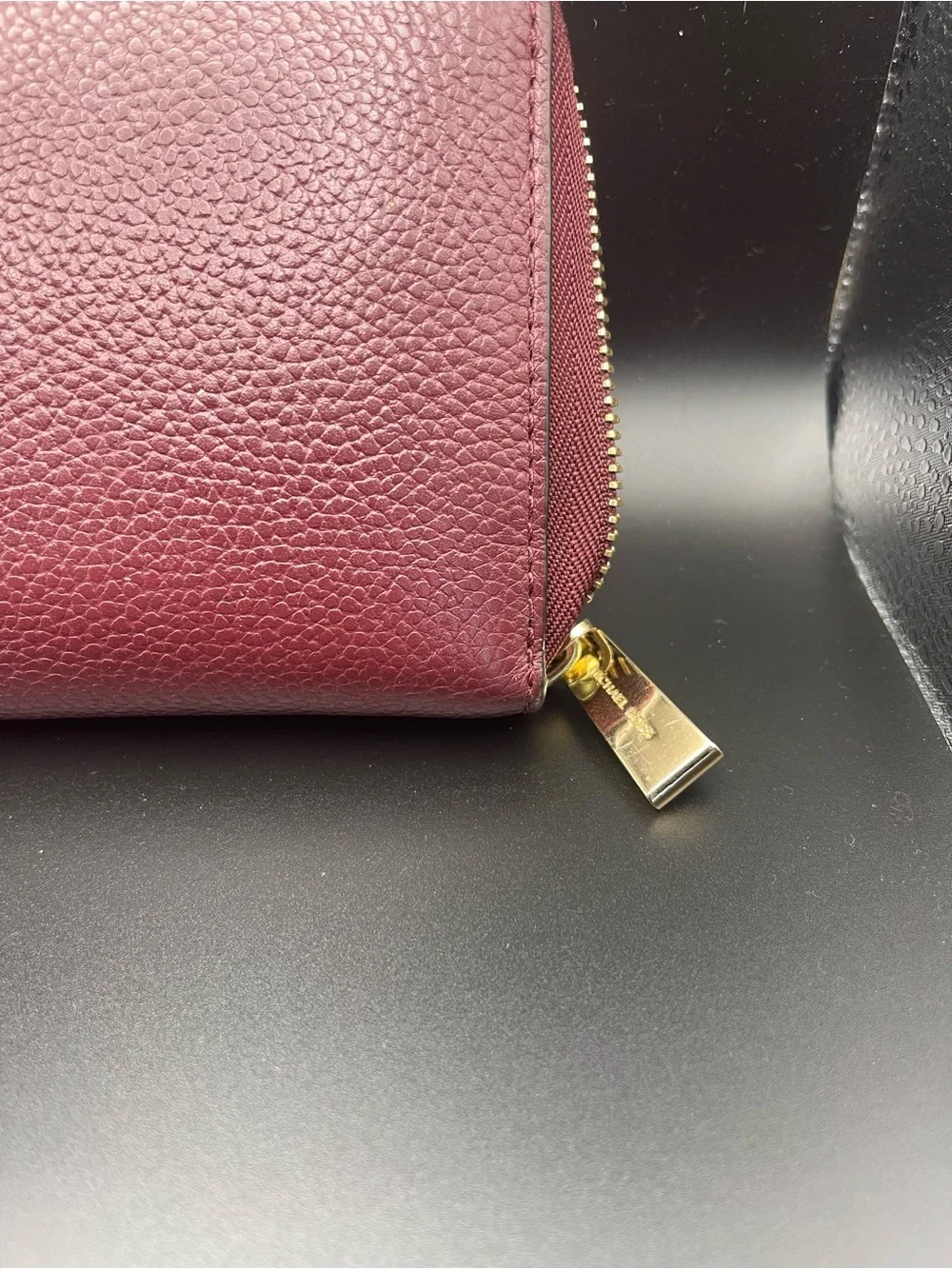 Michael Kors Oxblood Zip-Around Pebbled Leather Wallet with Gold Hardware